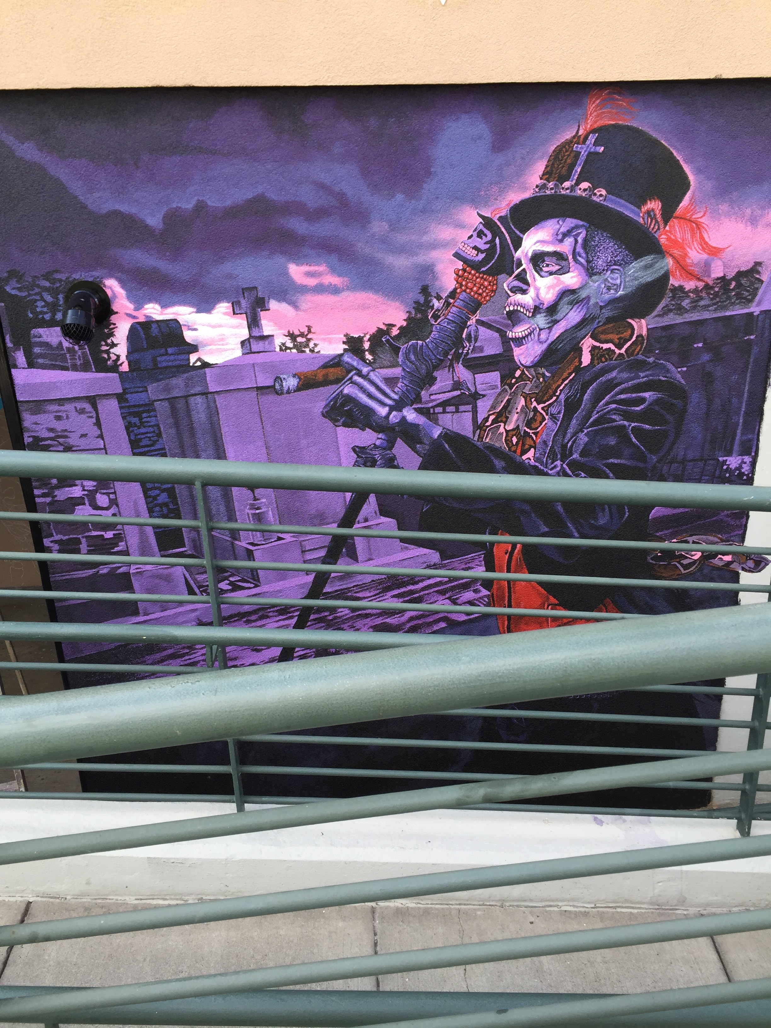 Voodoo skeleton guitarist mural — wide view