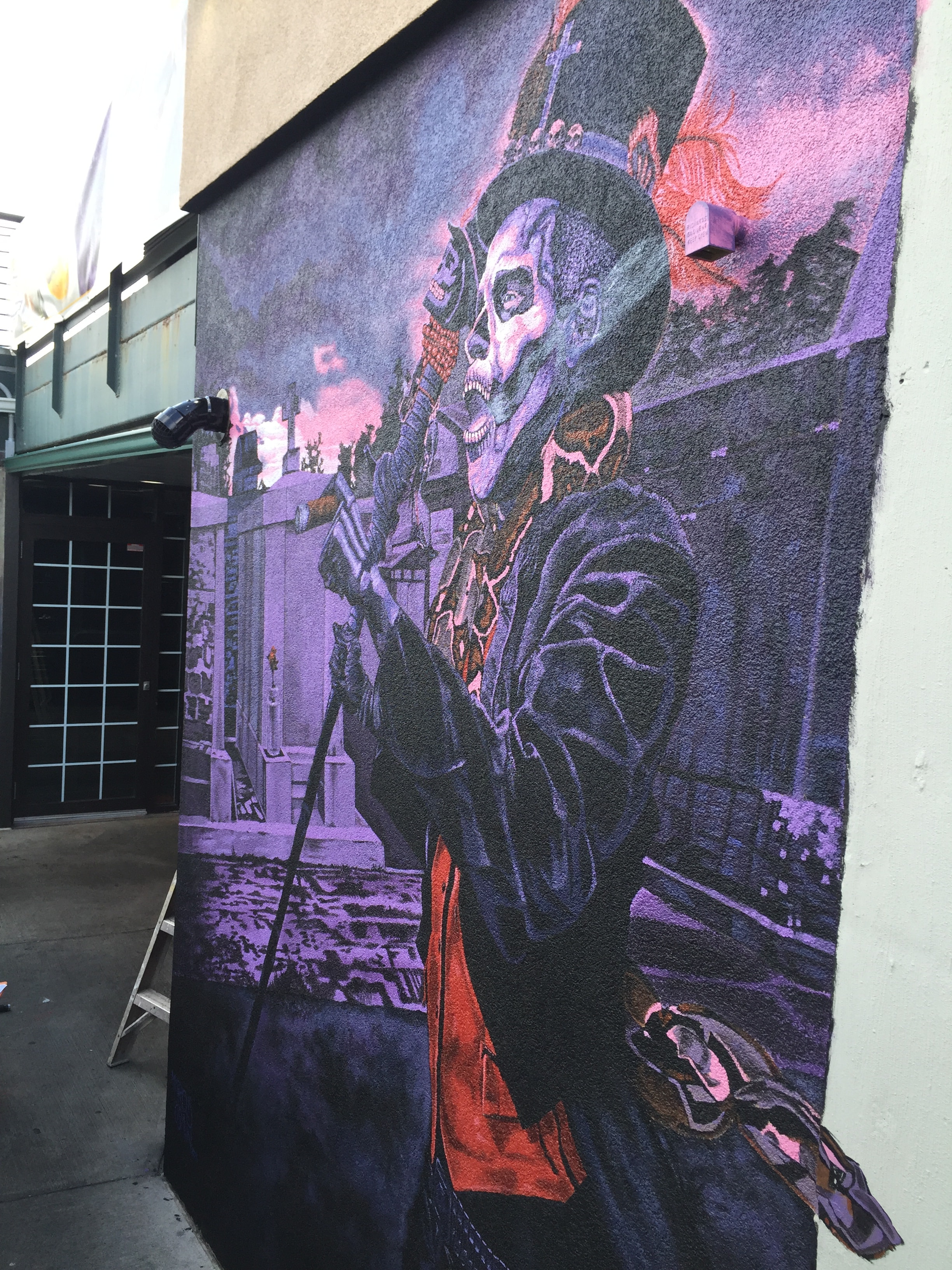 Voodoo skeleton guitarist mural — full closeup