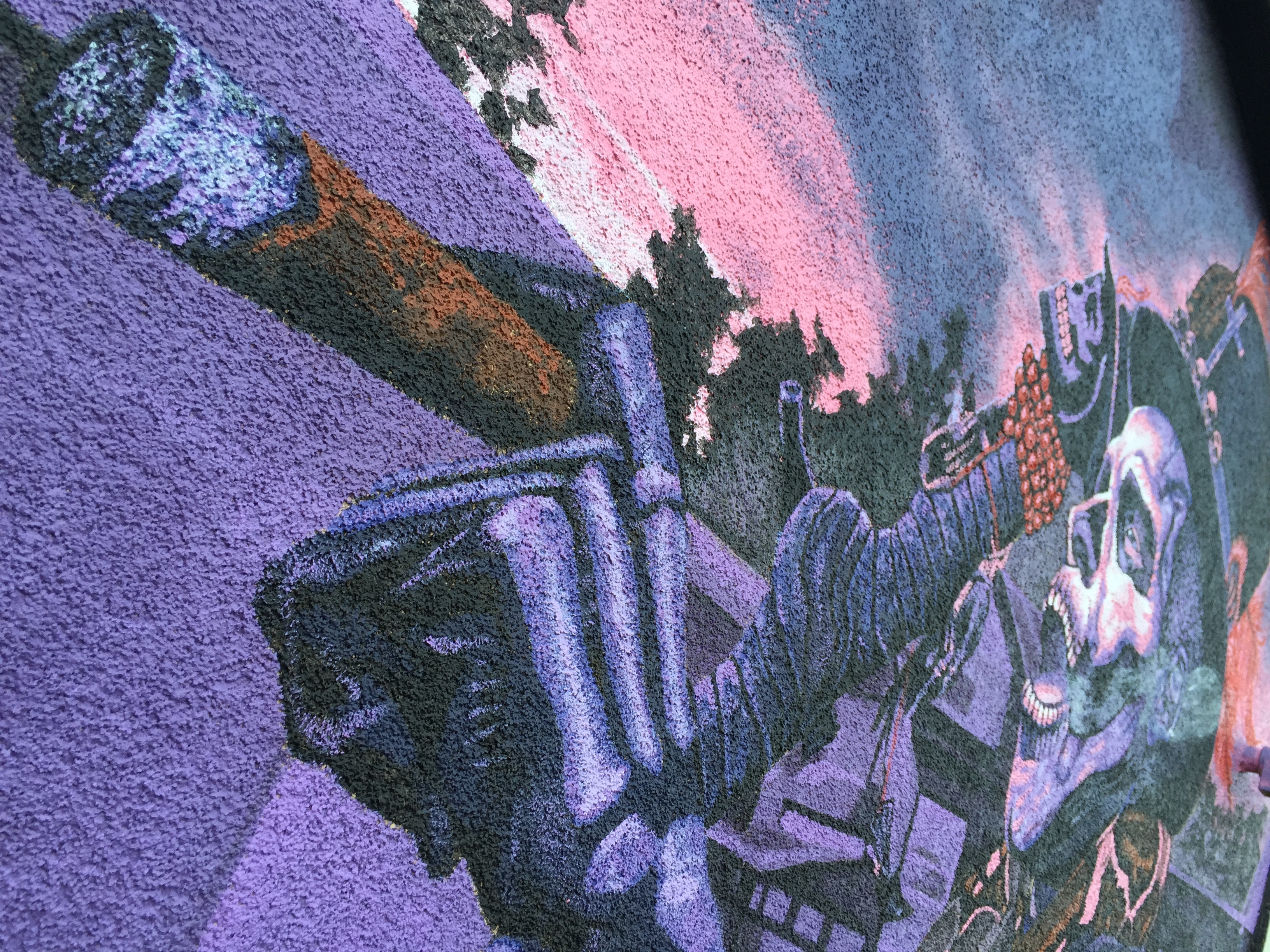 Voodoo mural viewed from below — ceiling angle