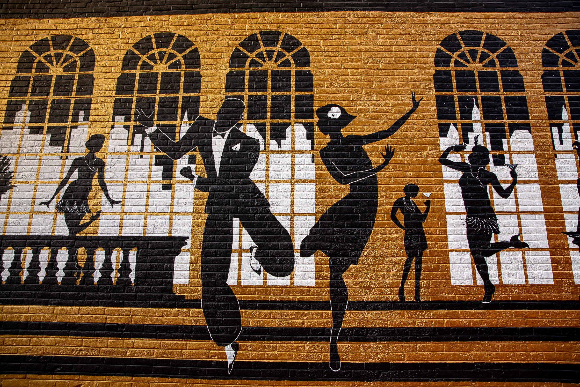 Jazz-age dancers silhouette detail